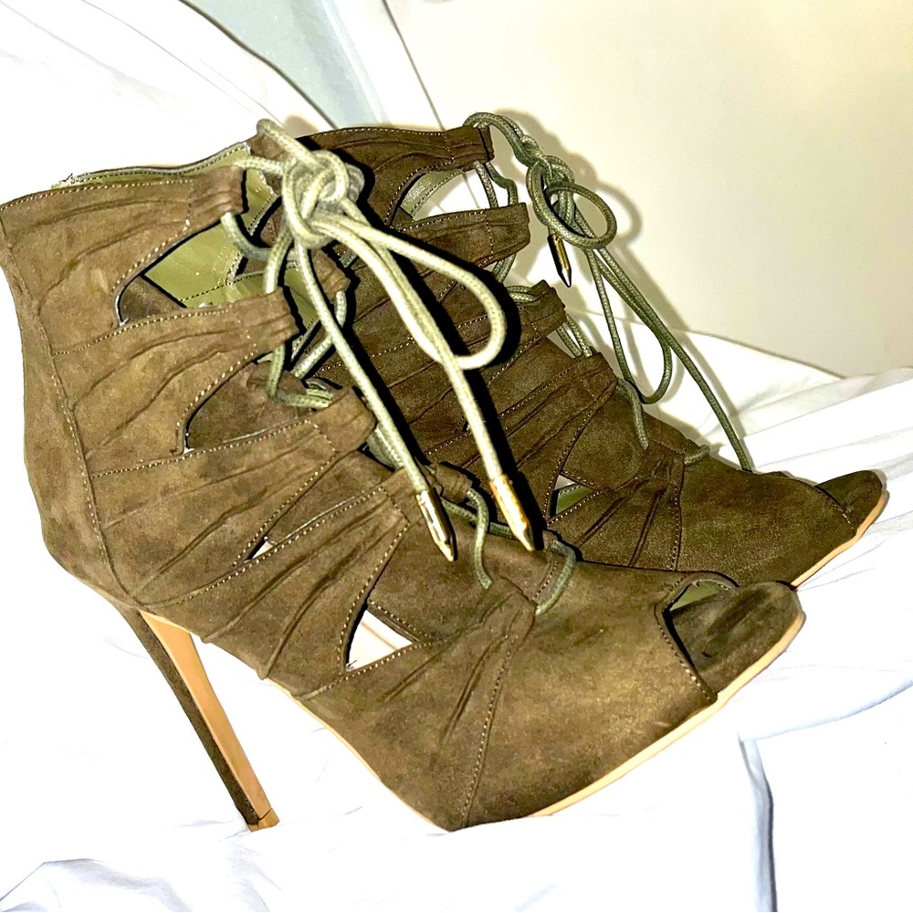 Woman’s fashion. Peep toe stiletto heel. Army green lace up bootie.